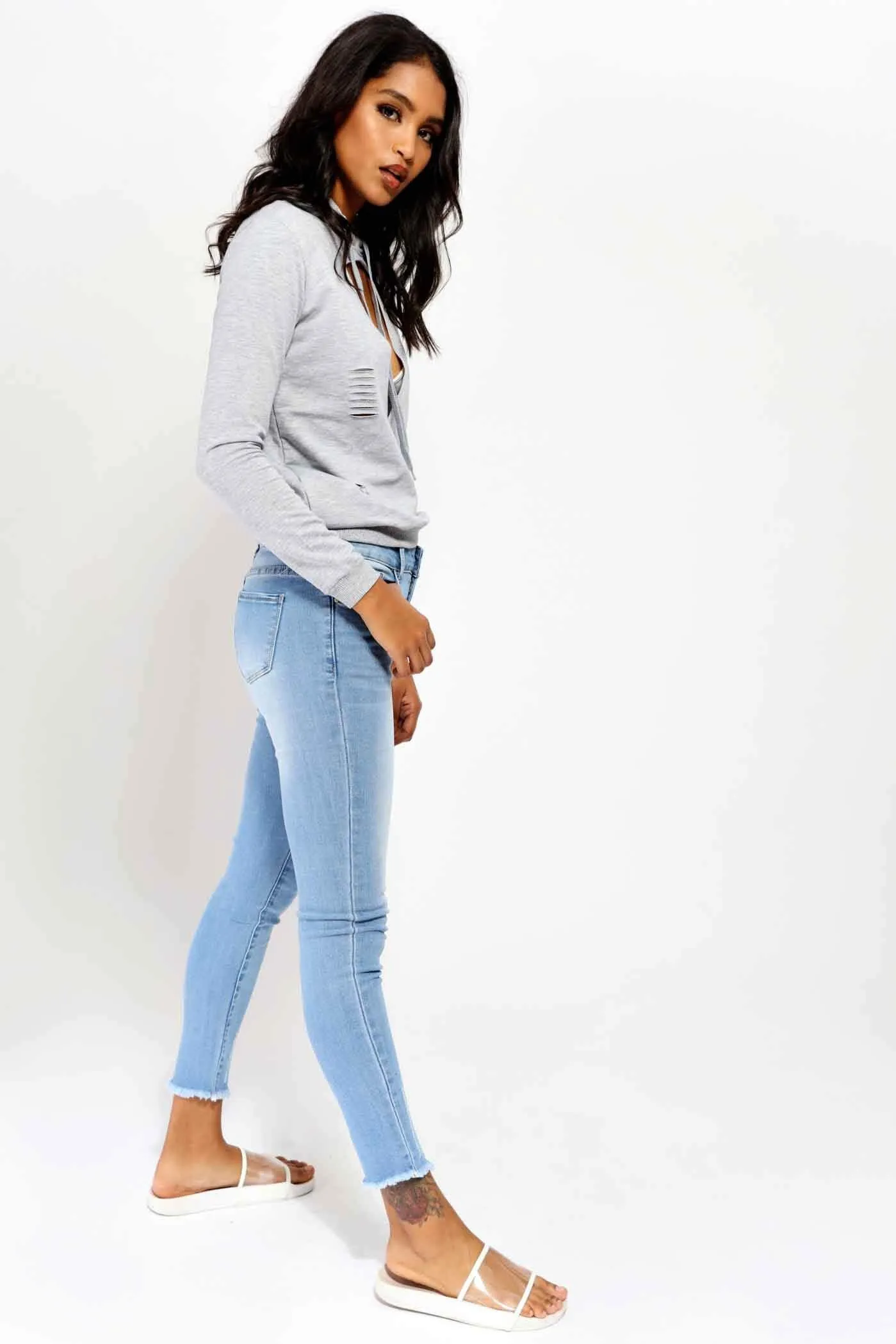 Blue Mid Rise Ripped Jeans With Frayed Hems