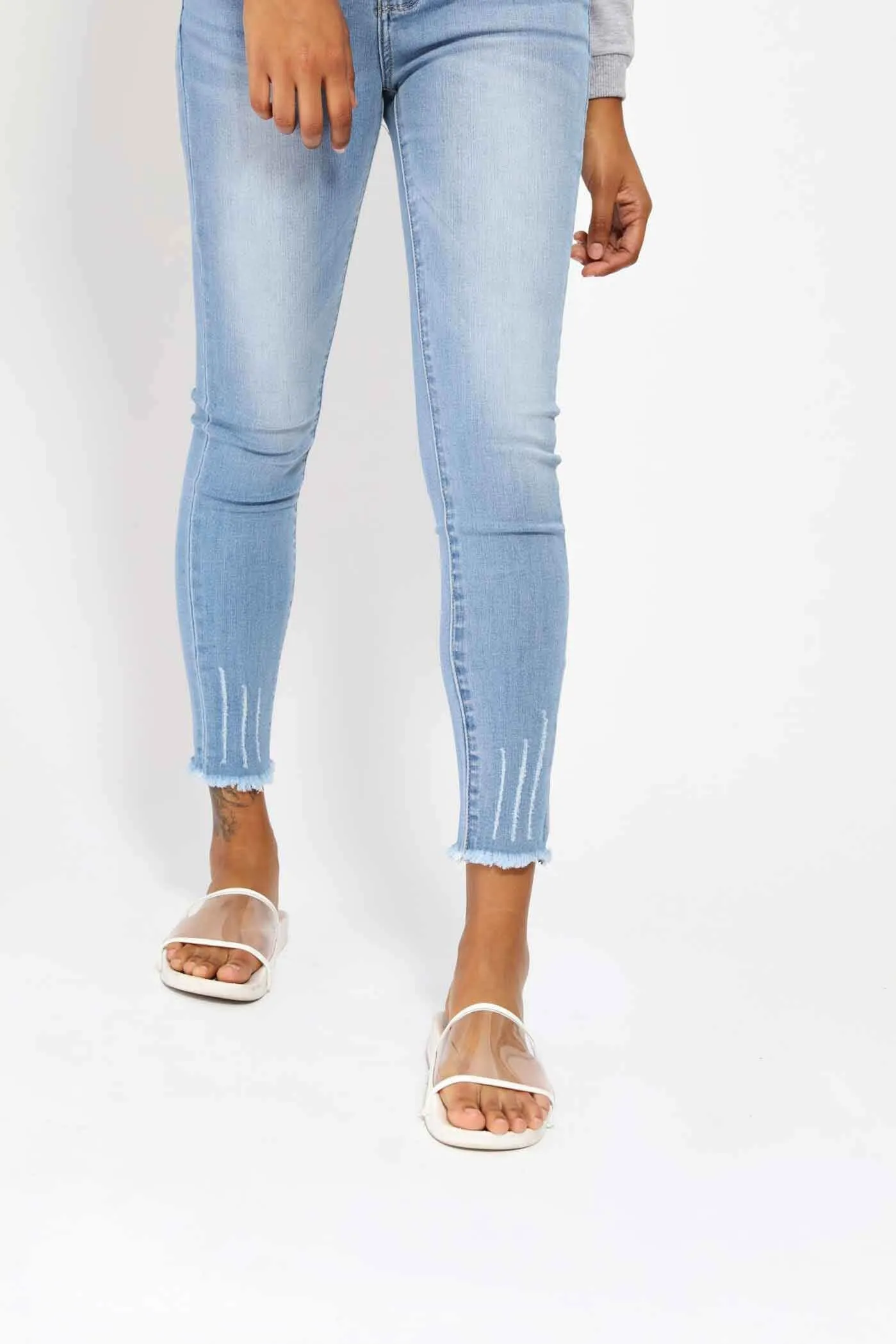 Blue Mid Rise Ripped Jeans With Frayed Hems