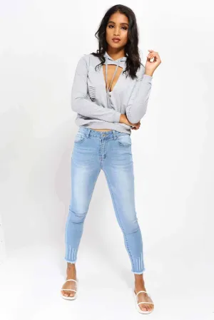 Blue Mid Rise Ripped Jeans With Frayed Hems