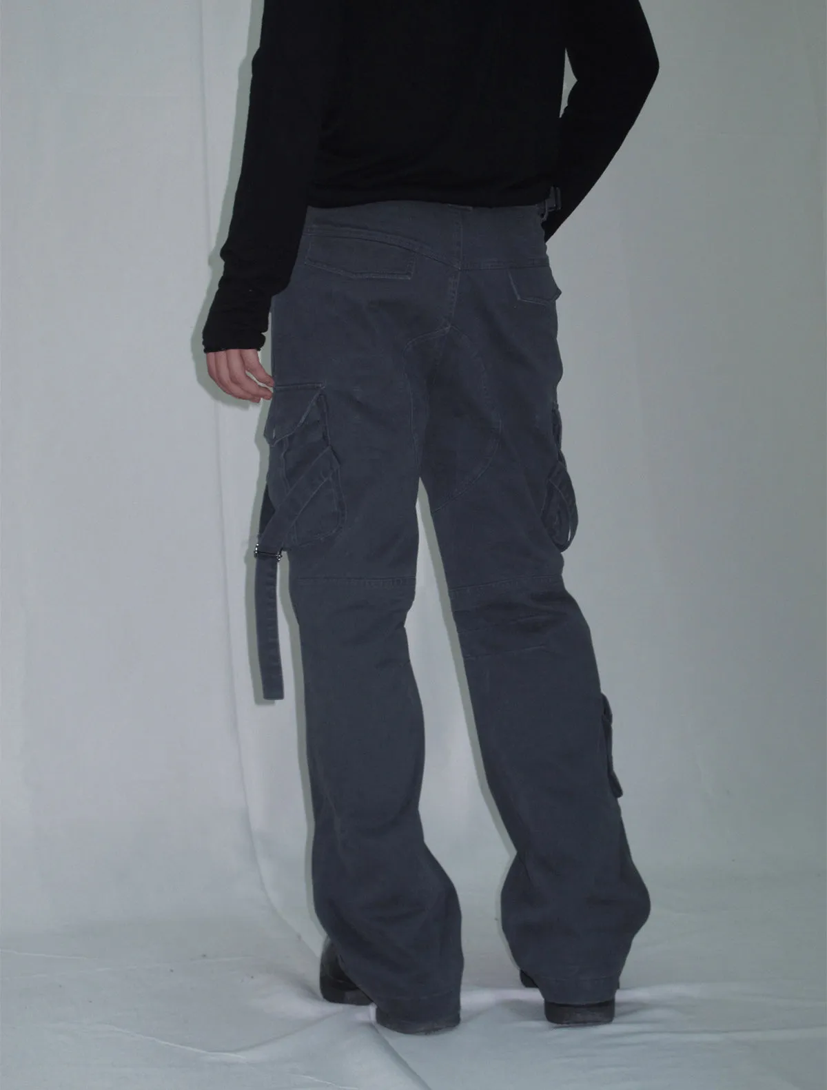 Cargo pants with multi-pocket straps