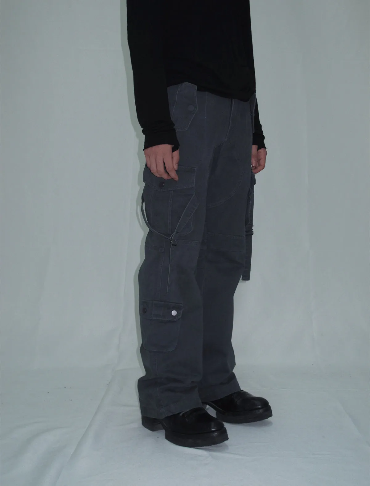 Cargo pants with multi-pocket straps