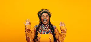 Cheerful ethnic woman wearing traditional clothing