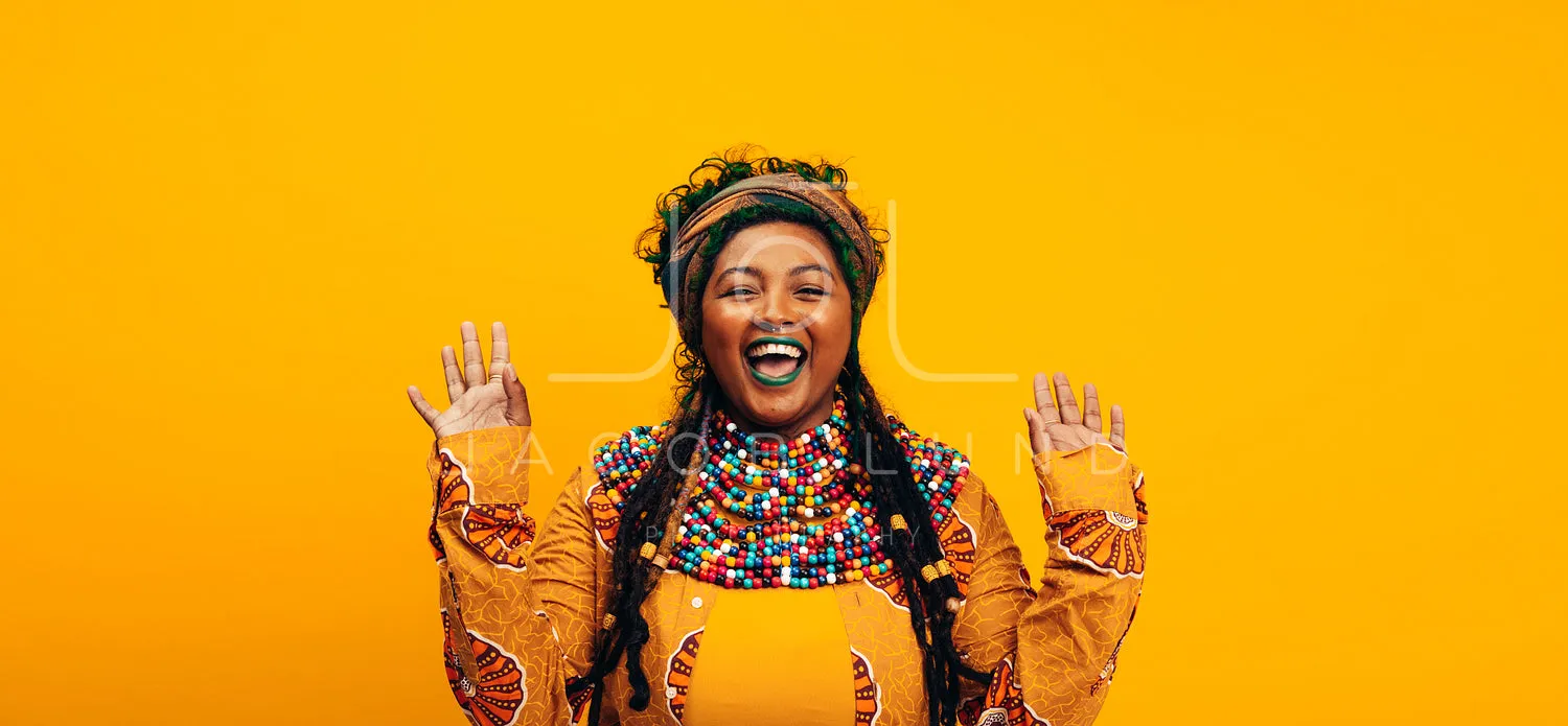 Cheerful ethnic woman wearing traditional clothing