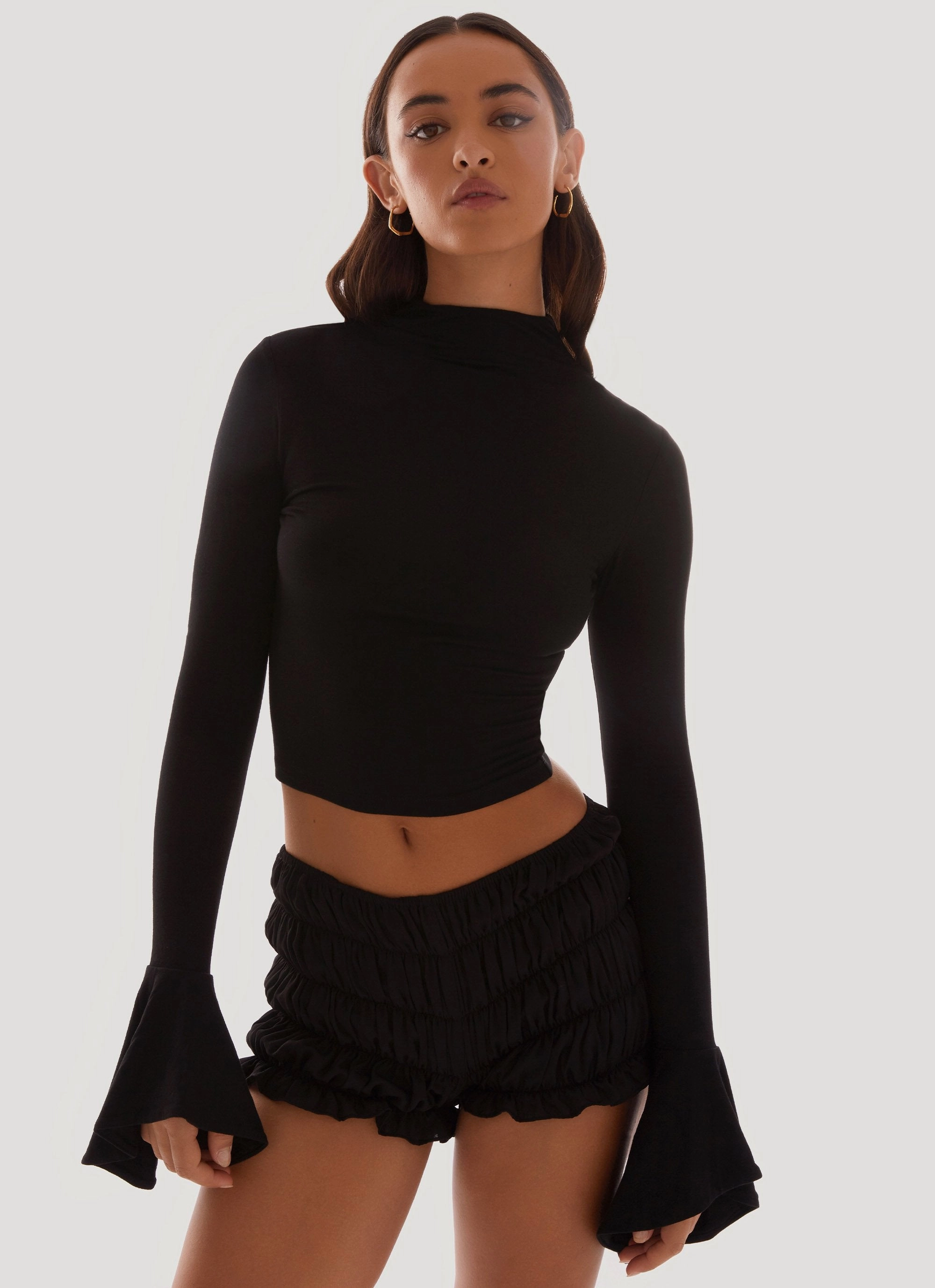 Reggie Long Sleeve Top - Black Elasticized Waistband Textured Fabric Finish