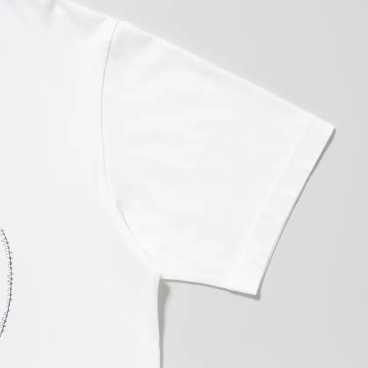 KAWS x Uniqlo Peace For All Tee