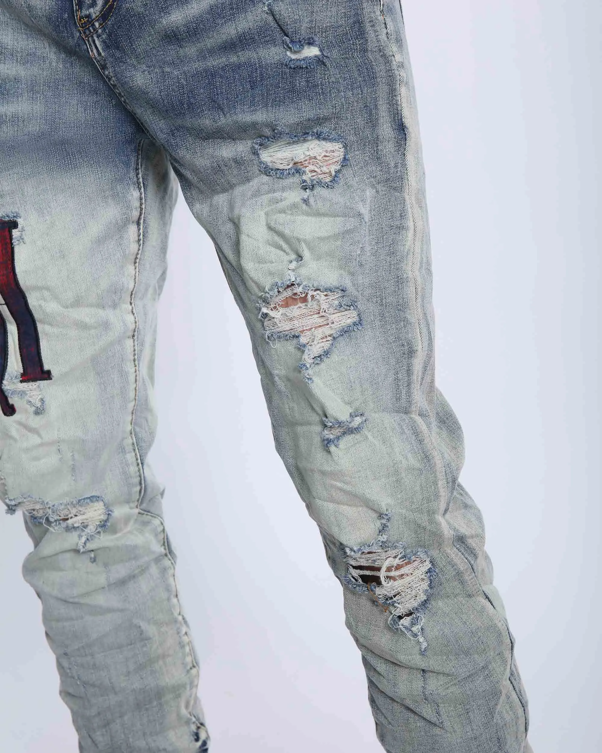 LOGEQI Light Washed Ripped Jeans