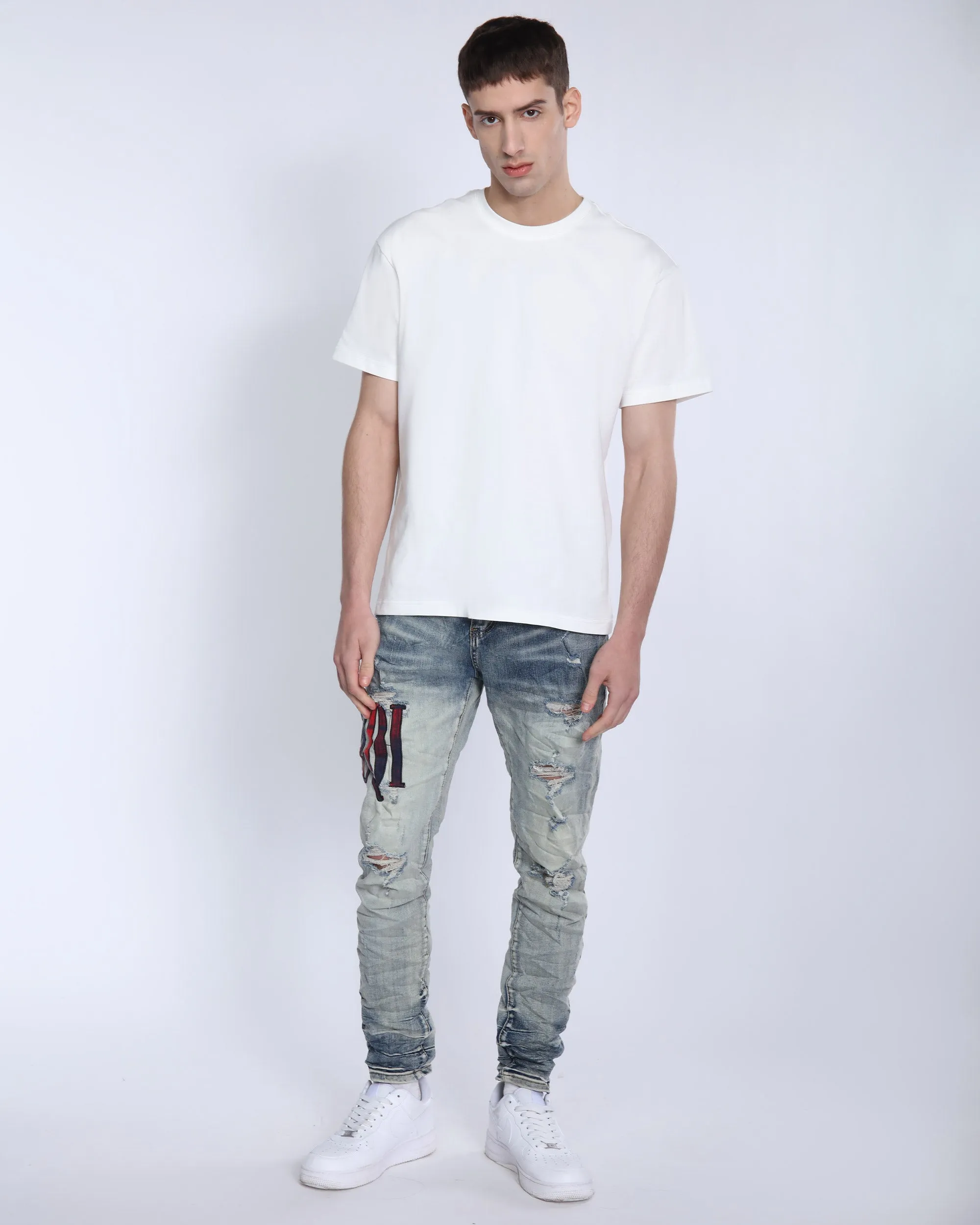 LOGEQI Light Washed Ripped Jeans