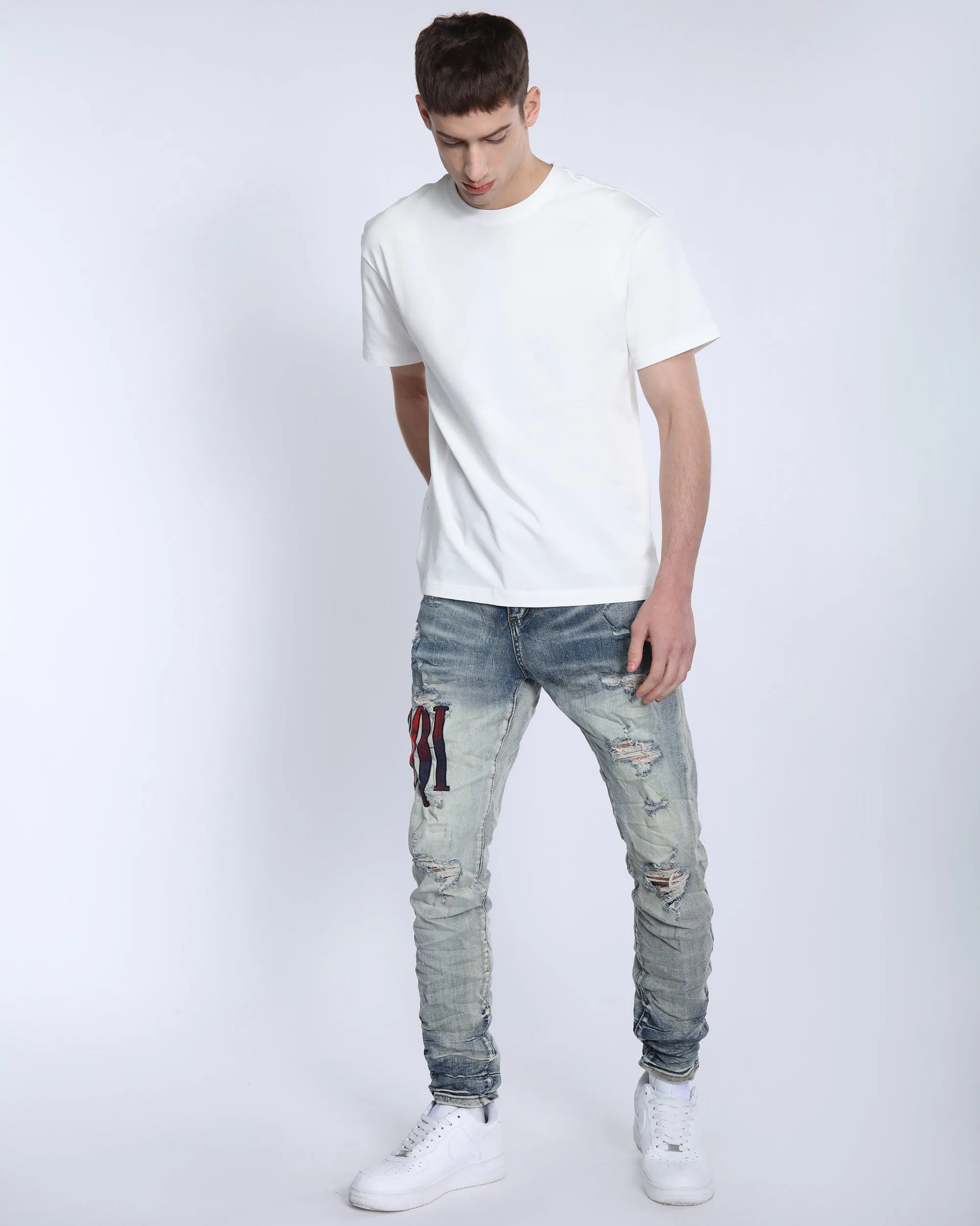 LOGEQI Light Washed Ripped Jeans
