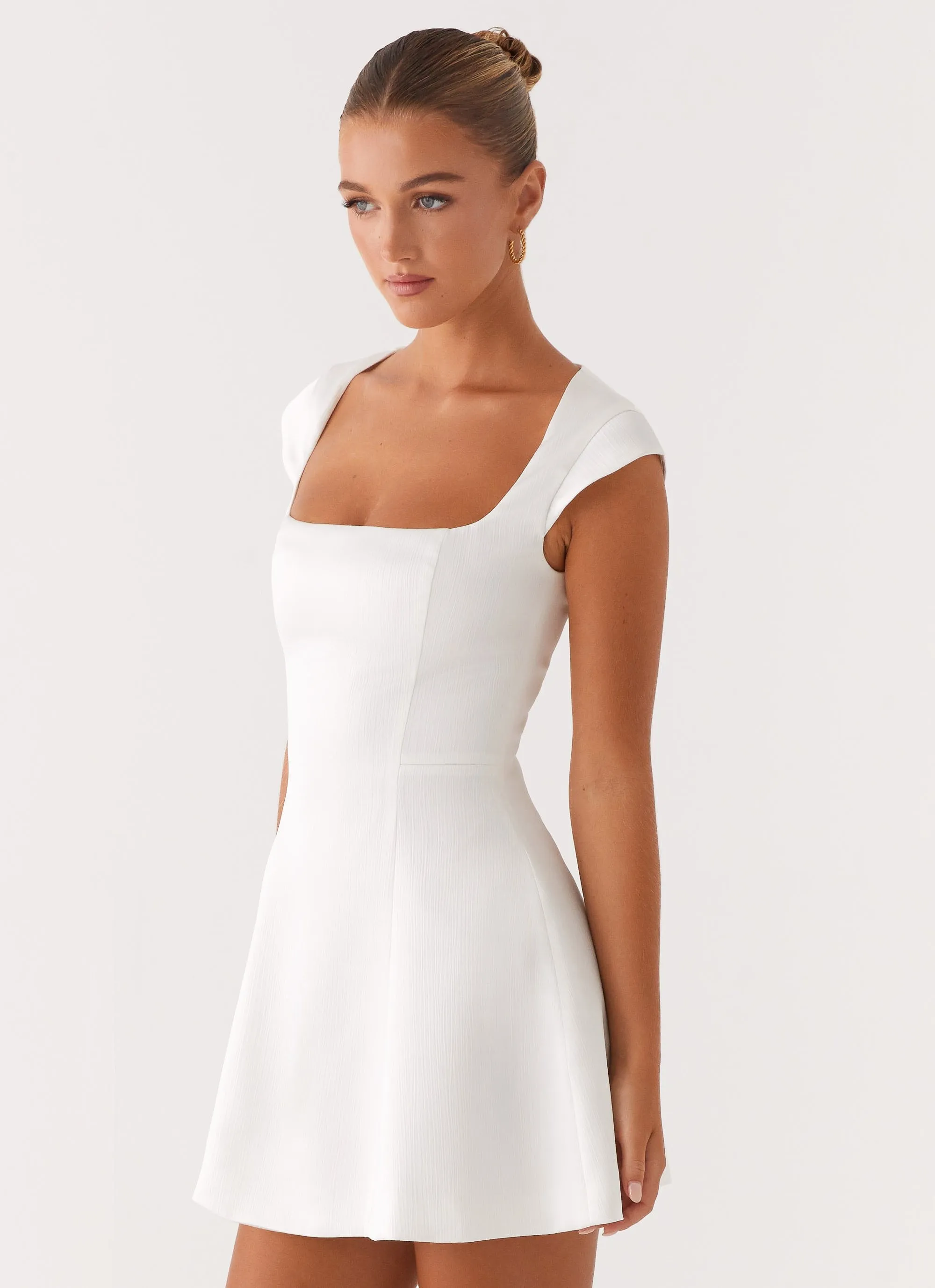 Flattering and Chic Occasion Ready Maryjane Mini Dress - White