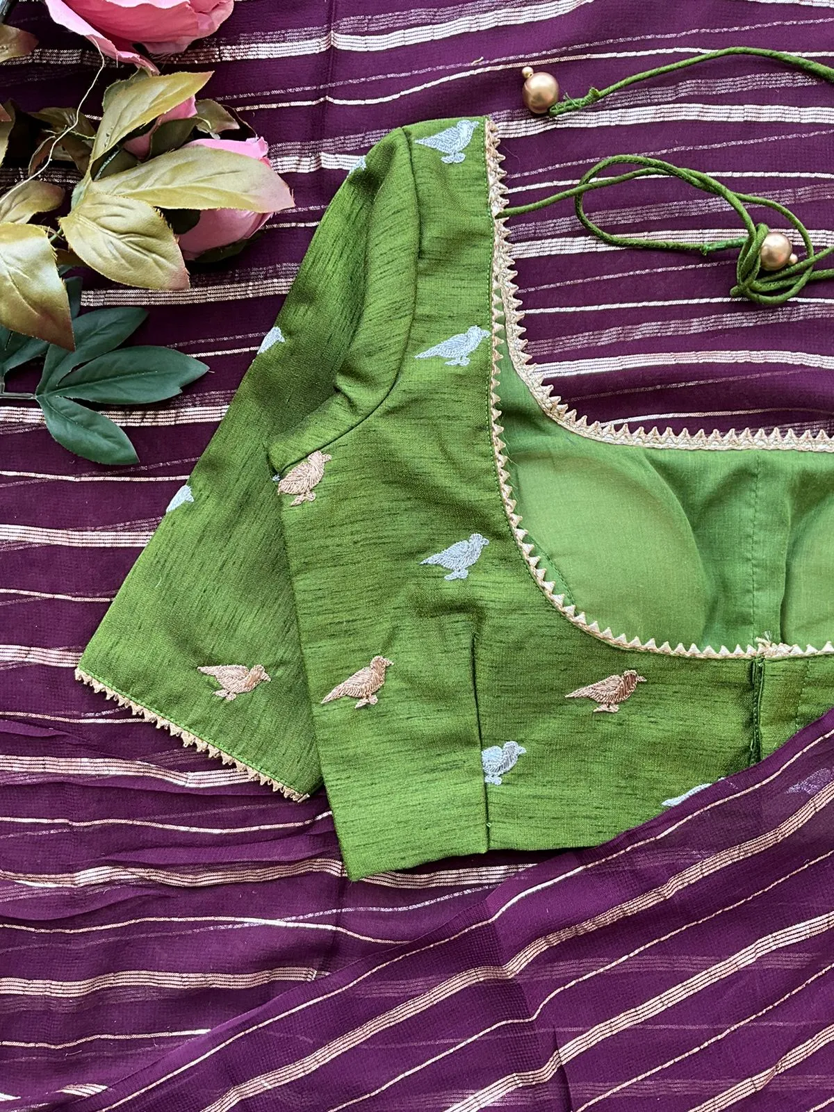 Purple chiffon saree with green hand worked blouse