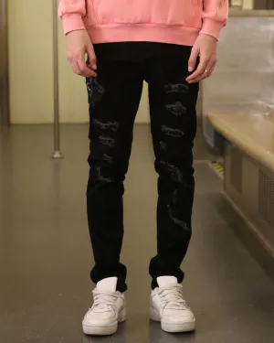 Stylish Black Ripped Jeans with Embroidered Flair