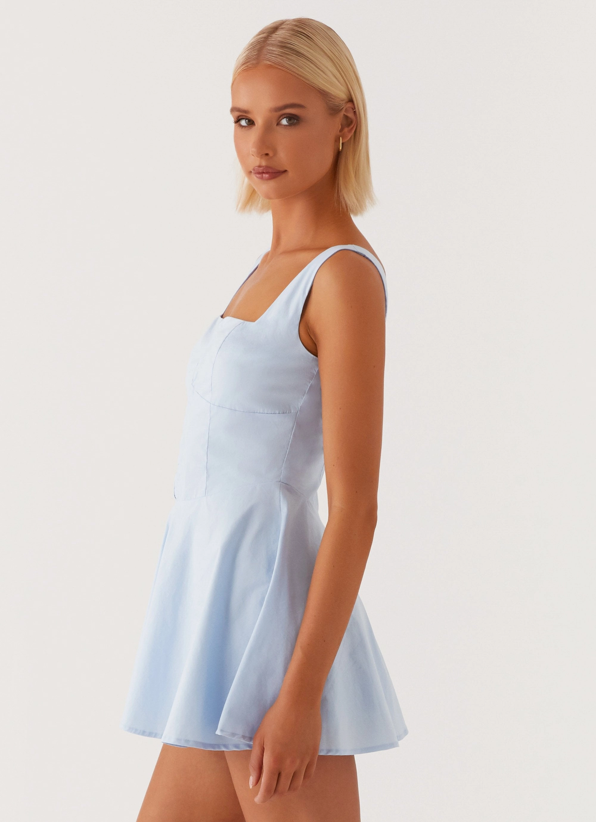 The Isle Mini Dress - Blue Shiny surface Work Look